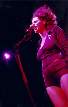 Deborah bathed in pink light